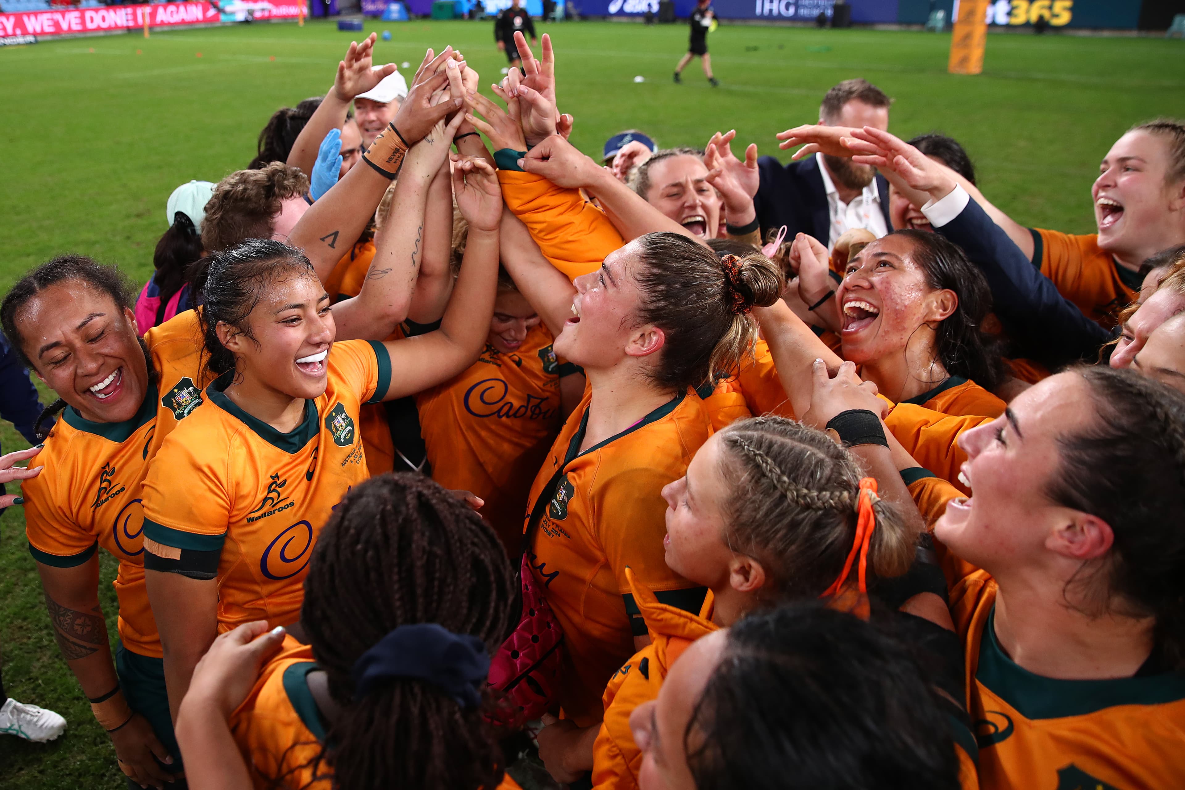 Wallaroos Team Hands Up