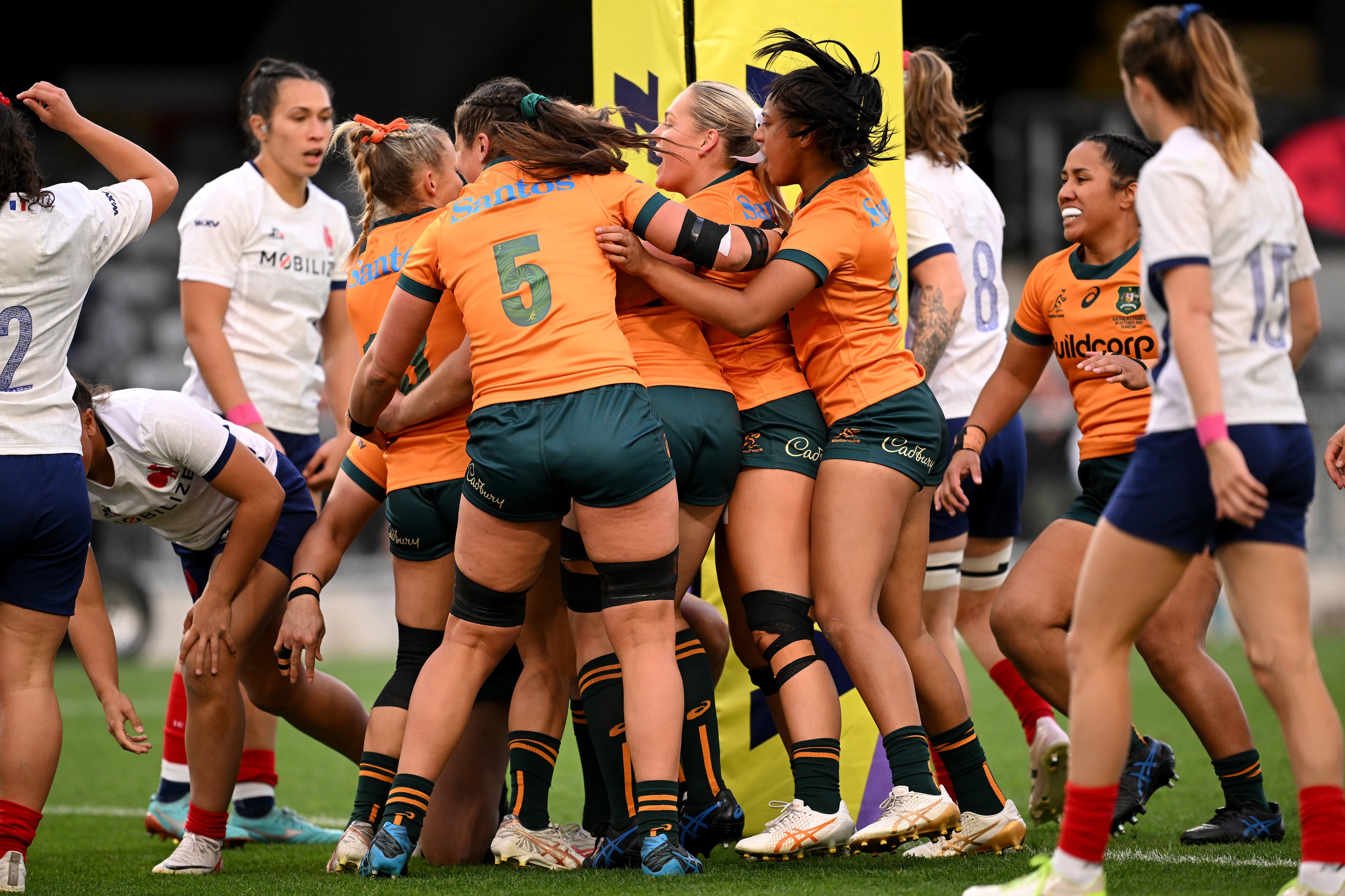 Wallaroos prop Eva Karpani is swamped after scoring the opening try against France during their WXV1 clash in Dunedin. Picture: Getty