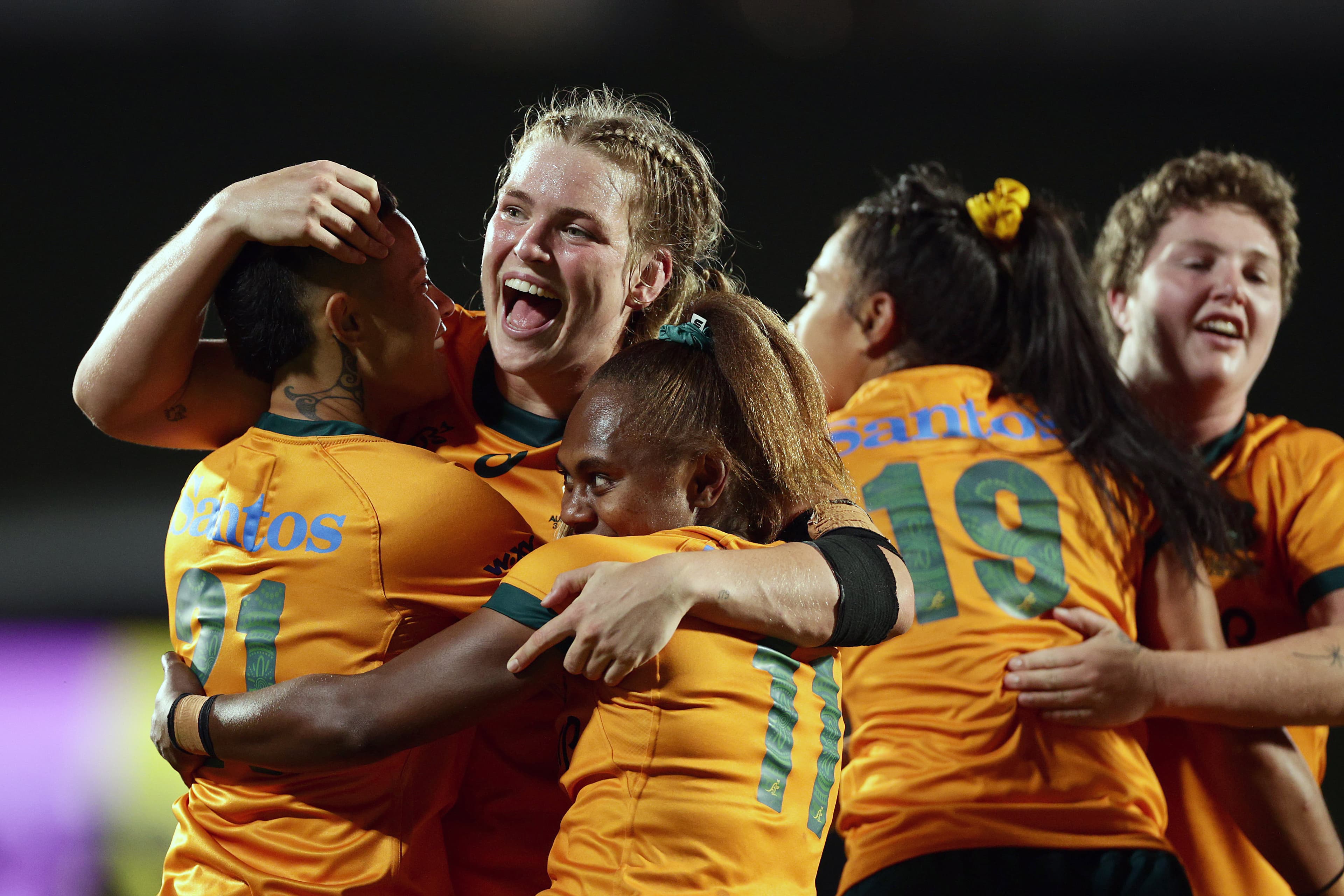 Best on Ground Kaitlan Leaney celebrates with Wallaroos teammates after Australia's 25-19 win over Wales in WXV1. Picture: Getty