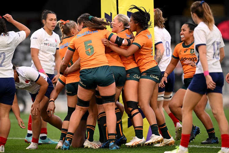 Wallaroos prop Eva Karpani is swamped after scoring the opening try against France during their WXV1 clash in Dunedin. Picture: Getty