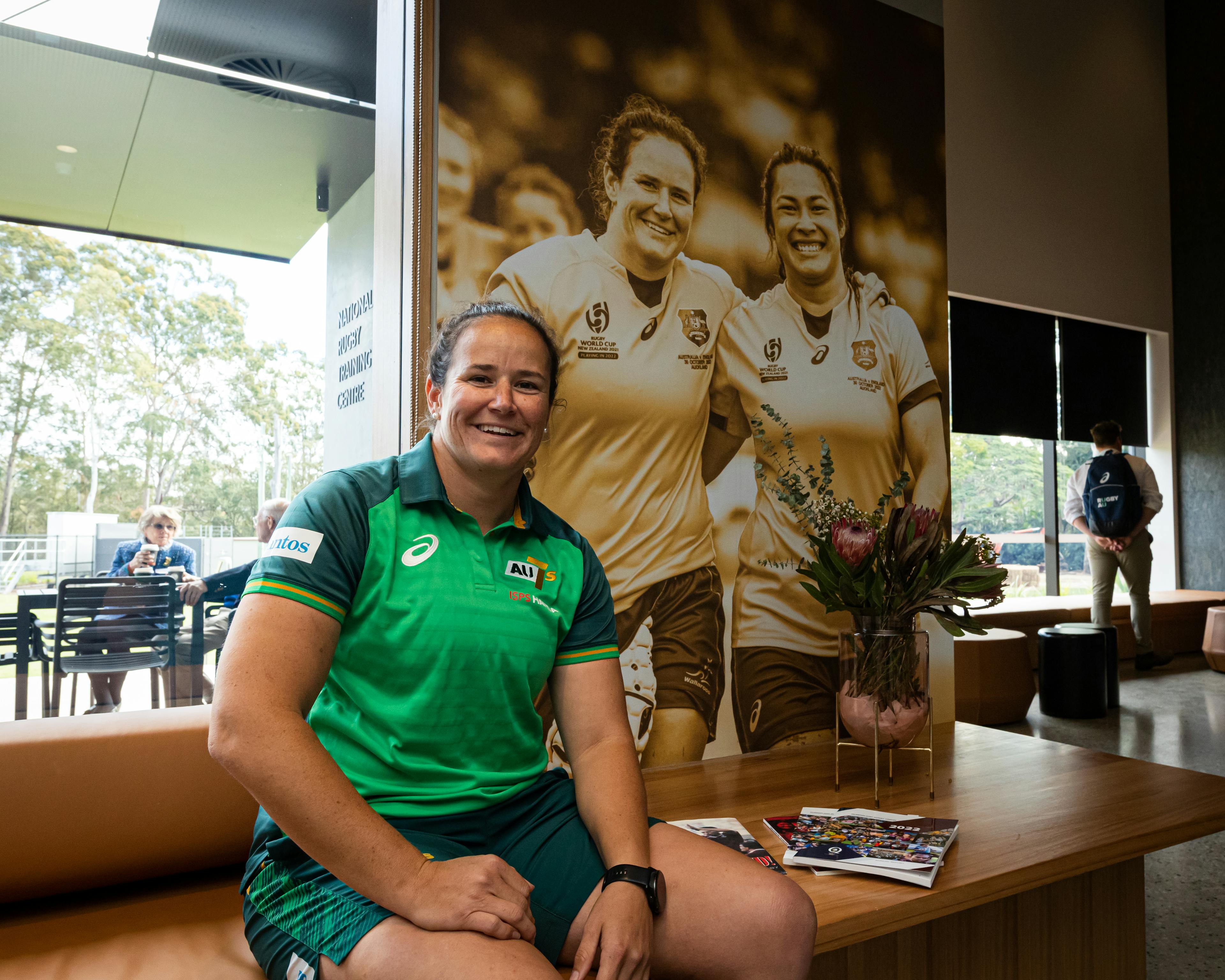 Shannon Parry with Shannon Parry as the Olympic Gold Medalist poses with a photo of herself and Liz Patu. Photo: Brenden Hertel/RA Media
